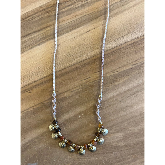 Round brass charms & amber macrame necklace